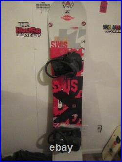 Sims snowboard with salomon fusion bindings and k2 haymaker boots